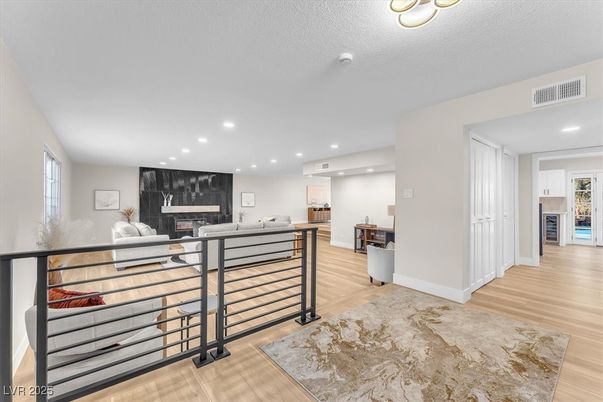 Fireplace, Interior, Living room, Recessed Lighting, Wood Texture Flooring
