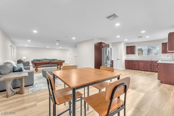 Billiard Table, Dining room, Game Room, Interior, Kitchen, Living room, Recessed Lighting, Stainless Steel Appliances, Wood Texture Flooring