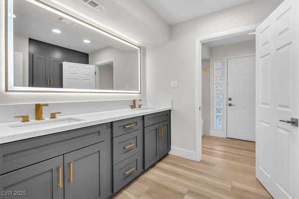 Bathroom, Dual Sink Vanities, Interior, Recessed Lighting, Wood Texture Flooring