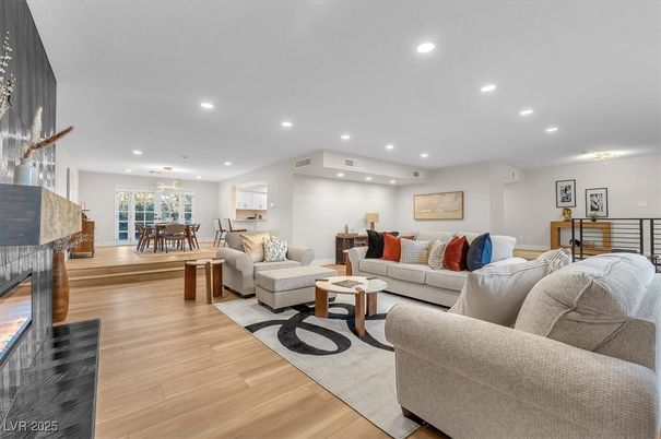 Dining room, Fireplace, Interior, Living room, Recessed Lighting, Wood Texture Flooring