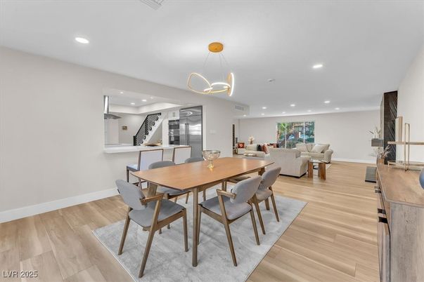Dining room, Interior, Kitchen, Living room, Pendant Lights, Recessed Lighting, Stainless Steel Appliances, Wood Texture Flooring