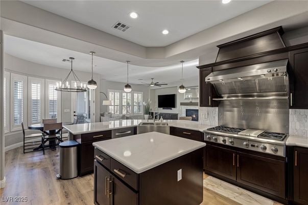 Dining room, Interior, Kitchen, Pendant Lights, Recessed Lighting, Stainless Steel Appliances, Wood Texture Flooring