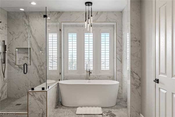 Bathroom, Free Standing Baths, Glass Shower, Interior, Marble, Marble Walls, Pendant Lights, Recessed Lighting