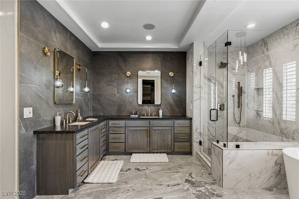 Bathroom, Dual Sink Vanities, Glass Shower, Interior, Marble, Marble Walls, Recessed Lighting
