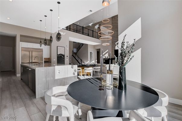 Dining room, Interior, Kitchen, Pendant Lights, Recessed Lighting, Stainless Steel Appliances, Wood Texture Flooring