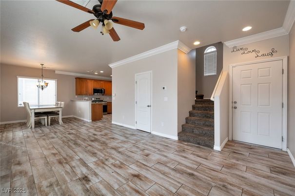 Chandelier, Dining room, Interior, Kitchen, Recessed Lighting, Stainless Steel Appliances, Wood Texture Flooring