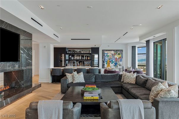 Fireplace, Interior, Living room, Marble Walls, Recessed Lighting, Wood Texture Flooring