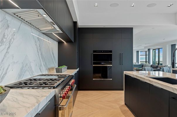 Interior, Kitchen, Marble Walls, Recessed Lighting, Stainless Steel Appliances, Wood Texture Flooring