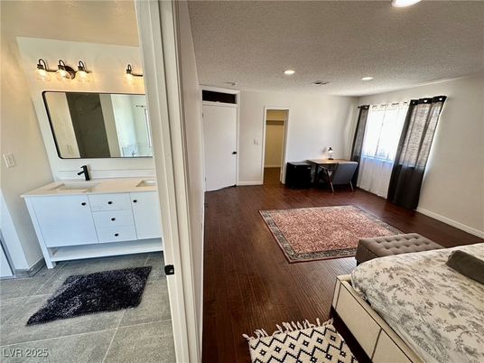 Bathroom, Dual Sink Vanities, Interior, Recessed Lighting, Wood Texture Flooring