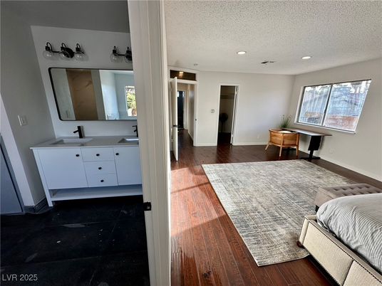 Bathroom, Dual Sink Vanities, Interior, Recessed Lighting, Wood Texture Flooring