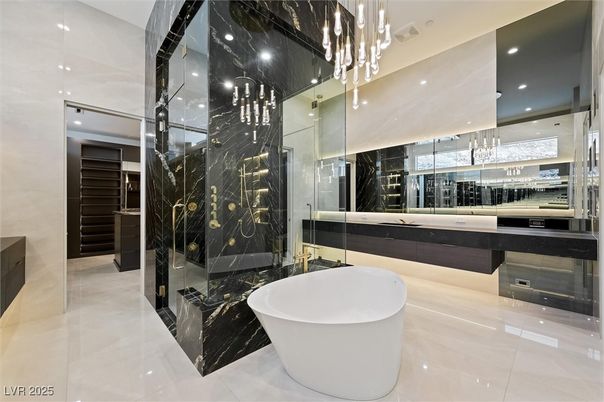 Bathroom, Free Standing Baths, Glass Shower, Interior, Marble, Marble Walls, Pendant Lights, Recessed Lighting