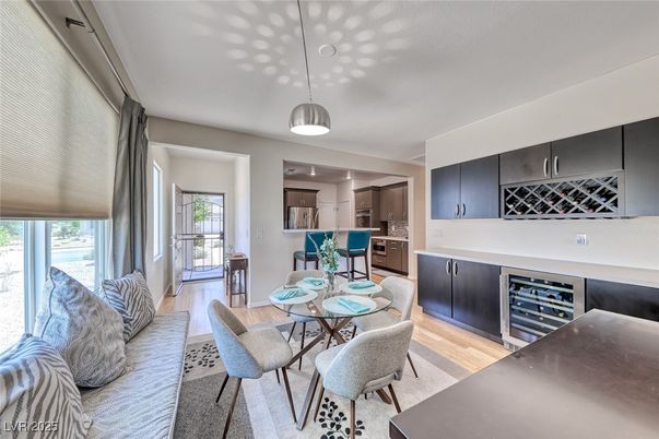 Dining room, Interior, Kitchen, Pendant Lights, Recessed Lighting, Stainless Steel Appliances, Wood Texture Flooring