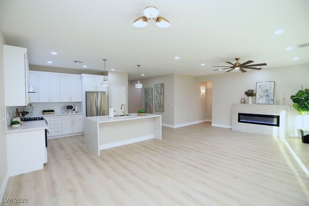 Fireplace, Interior, Kitchen, Pendant Lights, Recessed Lighting, Stainless Steel Appliances, Wood Texture Flooring