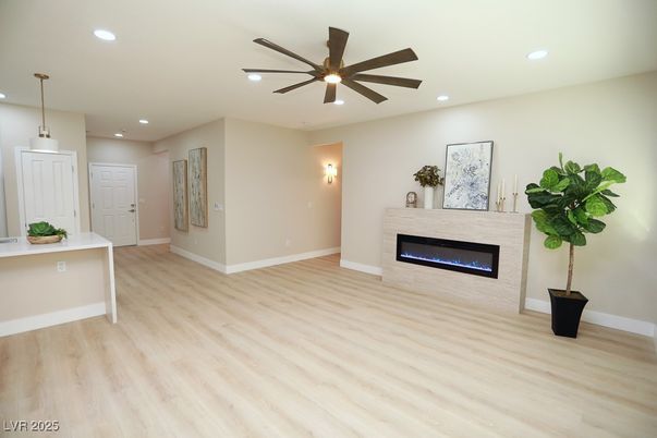 Empty room, Fireplace, Interior, Pendant Lights, Recessed Lighting, Wood Texture Flooring