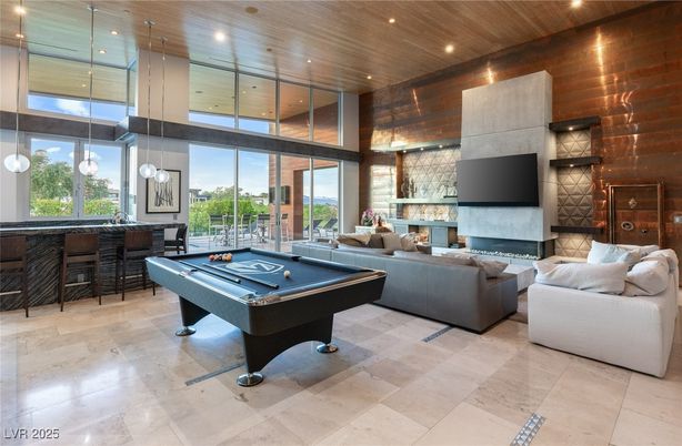 Billiard Table, Fireplace, Game Room, Interior, Living room, Pendant Lights, Recessed Lighting, Stone Walls, Wooden Ceilings, Wooden Walls