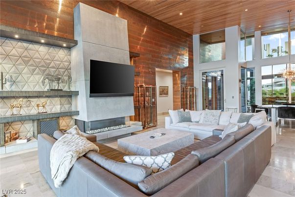 Dining room, Fireplace, Interior, Living room, Recessed Lighting, Stone Walls, Wooden Ceilings