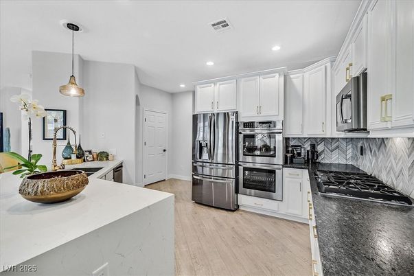 Interior, Kitchen, Pendant Lights, Recessed Lighting, Stainless Steel Appliances, Wood Texture Flooring