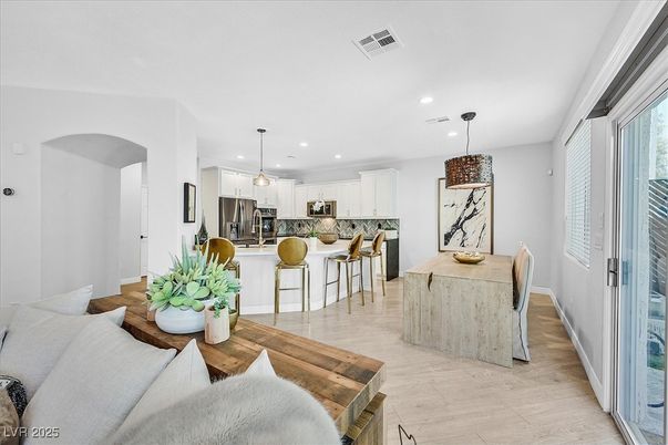Dining room, Interior, Kitchen, Pendant Lights, Recessed Lighting, Stainless Steel Appliances, Wood Texture Flooring
