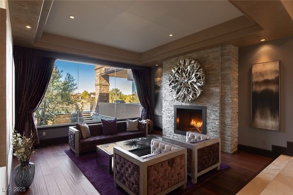 Fireplace, Interior, Living room, Recessed Lighting, Stone Walls, Wood Texture Flooring