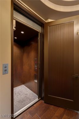 Elevator, Interior, Recessed Lighting, Wood Texture Flooring, Wooden Walls
