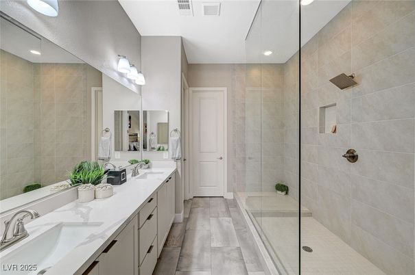 Bathroom, Dual Sink Vanities, Glass Shower, Interior, Recessed Lighting, Wood Texture Flooring