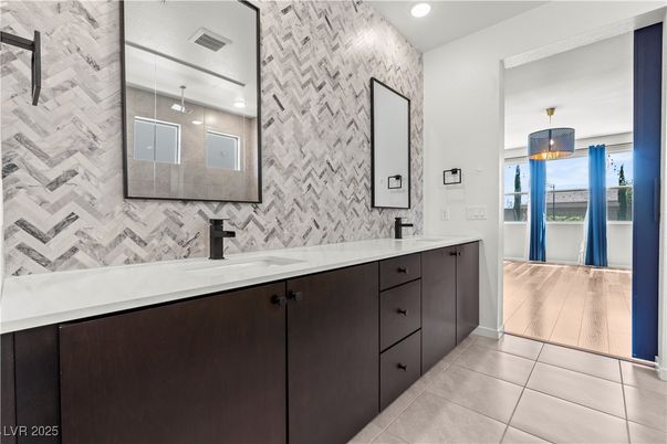 Bathroom, Dual Sink Vanities, Interior, Pendant Lights, Recessed Lighting, Wood Texture Flooring