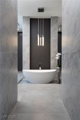 Bathroom, Free Standing Baths, Interior, Marble Walls, Pendant Lights, Recessed Lighting