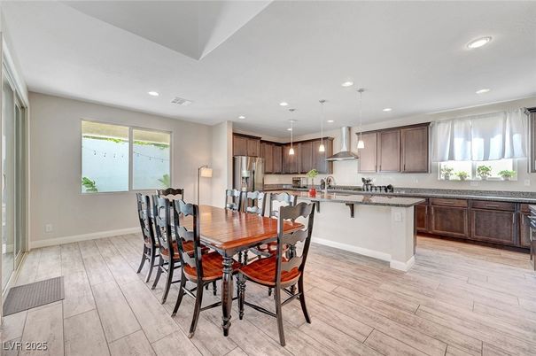 Dining room, Interior, Kitchen, Pendant Lights, Recessed Lighting, Stainless Steel Appliances, Wood Texture Flooring