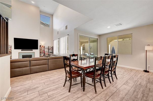 Dining room, Fireplace, Interior, Living room, Recessed Lighting, Wood Texture Flooring