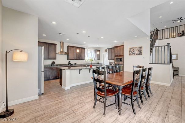 Dining room, Interior, Kitchen, Pendant Lights, Recessed Lighting, Stainless Steel Appliances, Wood Texture Flooring