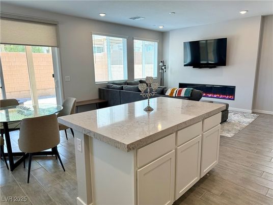 Dining room, Fireplace, Interior, Kitchen, Living room, Recessed Lighting, Wood Texture Flooring