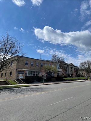 Exterior, Facade, Brick Facade, Condo Building