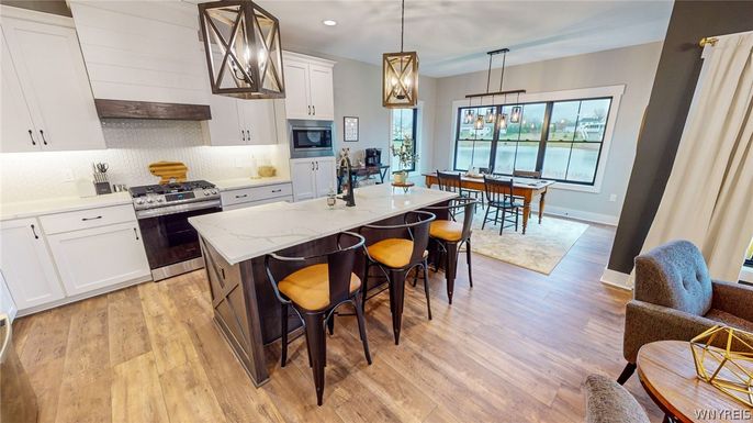 Dining room, Interior, Kitchen, Pendant Lights, Recessed Lighting, Stainless Steel Appliances, Water, Wood Texture Flooring