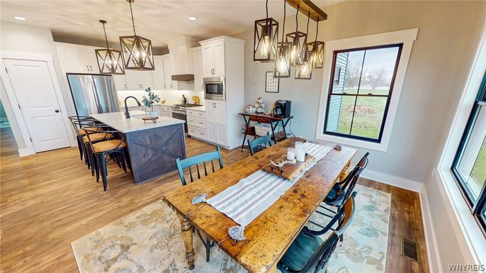 Dining room, Interior, Kitchen, Pendant Lights, Recessed Lighting, Stainless Steel Appliances, Wood Texture Flooring