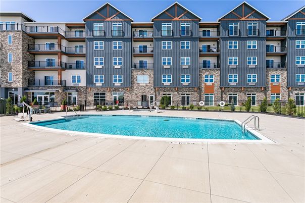 Exterior, Facade, Pool, Condo Building