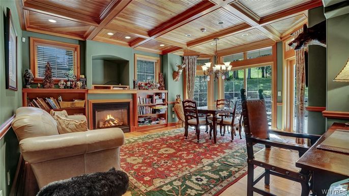 Chandelier, Dining room, Fireplace, Interior, Living room, Recessed Lighting, Wooden Beams, Wooden Ceilings, Wood Texture Flooring
