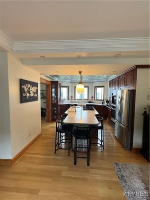 Dining room, Interior, Kitchen, Pendant Lights, Stainless Steel Appliances, Wood Texture Flooring