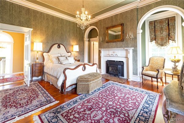 Bedroom, Chandelier, Fireplace, Interior, Wood Texture Flooring