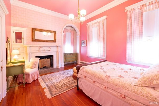 Bedroom, Chandelier, Fireplace, Interior, Wood Texture Flooring