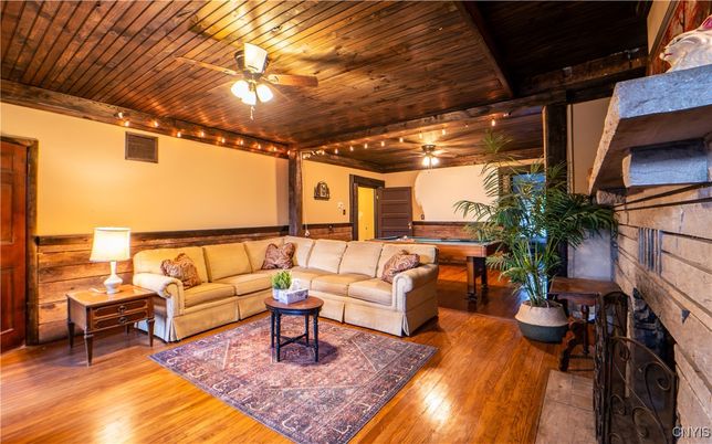 Billiard Table, Fireplace, Game Room, Interior, Living room, Wooden Ceilings, Wood Texture Flooring