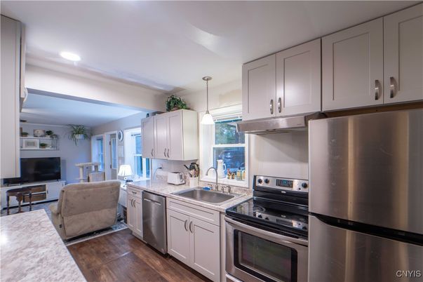 Interior, Kitchen, Pendant Lights, Recessed Lighting, Stainless Steel Appliances, Wood Texture Flooring