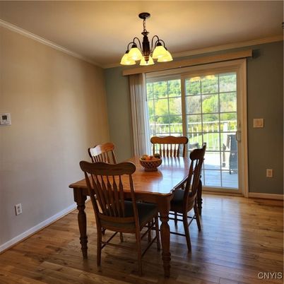 Chandelier, Dining room, Interior, Wood Texture Flooring