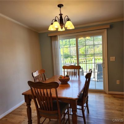 Chandelier, Dining room, Interior, Wood Texture Flooring
