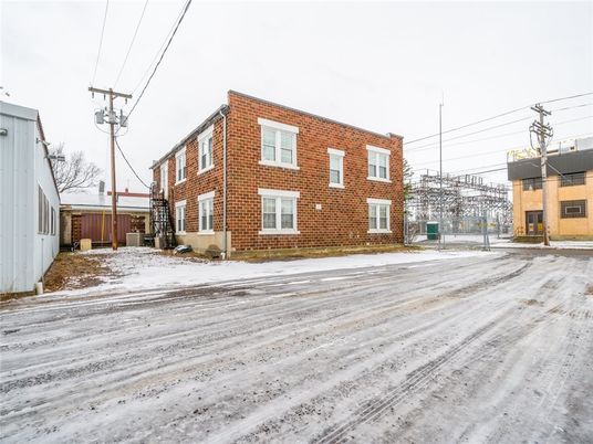 Exterior, Facade, Brick Facade, Condo Building