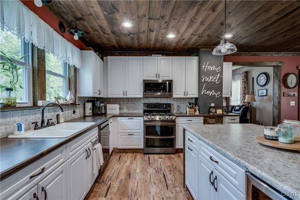 Interior, Kitchen, Pendant Lights, Recessed Lighting, Stainless Steel Appliances, Wooden Ceilings, Wood Texture Flooring