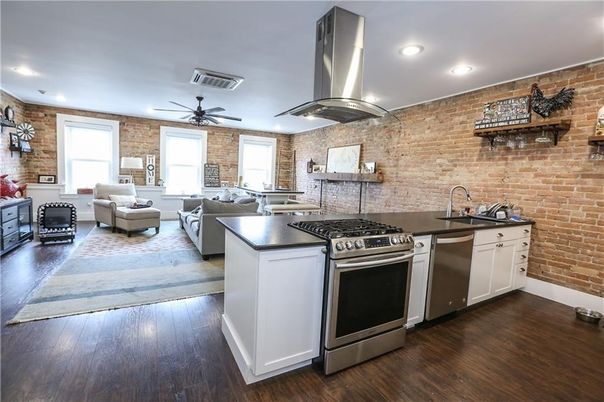 Interior, Kitchen, Living room, Recessed Lighting, Stainless Steel Appliances, Stone Walls, Wood Texture Flooring