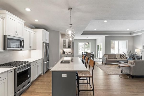 Dining room, Interior, Kitchen, Living room, Pendant Lights, Recessed Lighting, Stainless Steel Appliances, Wood Texture Flooring