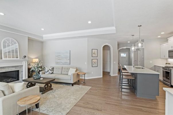 Dining room, Fireplace, Interior, Kitchen, Living room, Pendant Lights, Recessed Lighting, Stainless Steel Appliances, Wood Texture Flooring