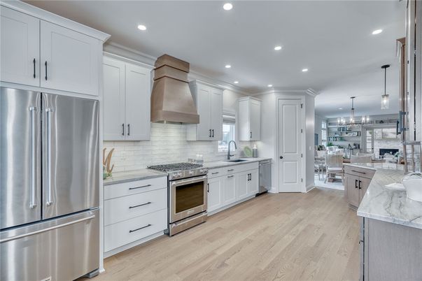 Dining room, Interior, Kitchen, Pendant Lights, Recessed Lighting, Stainless Steel Appliances, Wood Texture Flooring