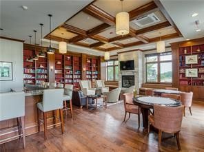 Dining room, Fireplace, Interior, Pendant Lights, Recessed Lighting, Wooden Beams, Wood Texture Flooring